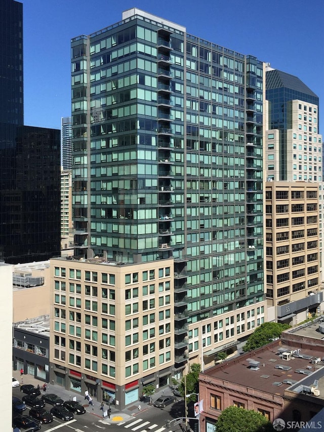 view of building exterior with a view of city