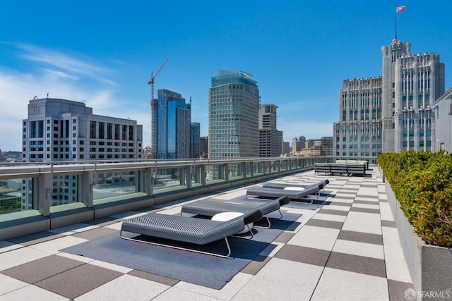 view of patio / terrace featuring a city view