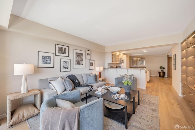 1177 California St Unit 212, San Francisco, CA 94108 - living room featuring light wood-type flooring and a chandelier