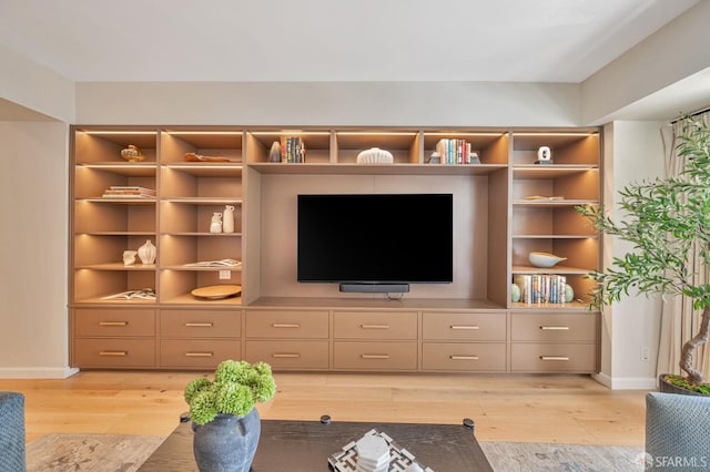 1177 California St Unit 212, San Francisco, CA 94108 - unfurnished living room featuring light wood-style floors and baseboards