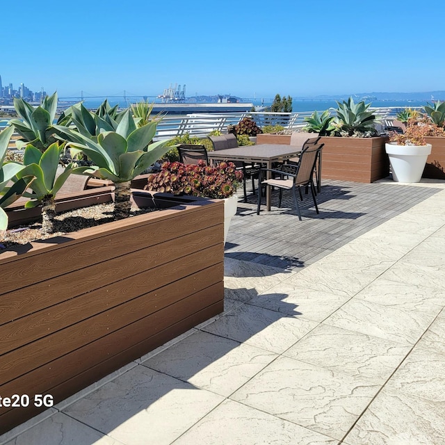 view of patio / terrace with a water view