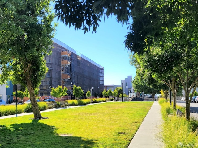 surrounding community featuring a lawn