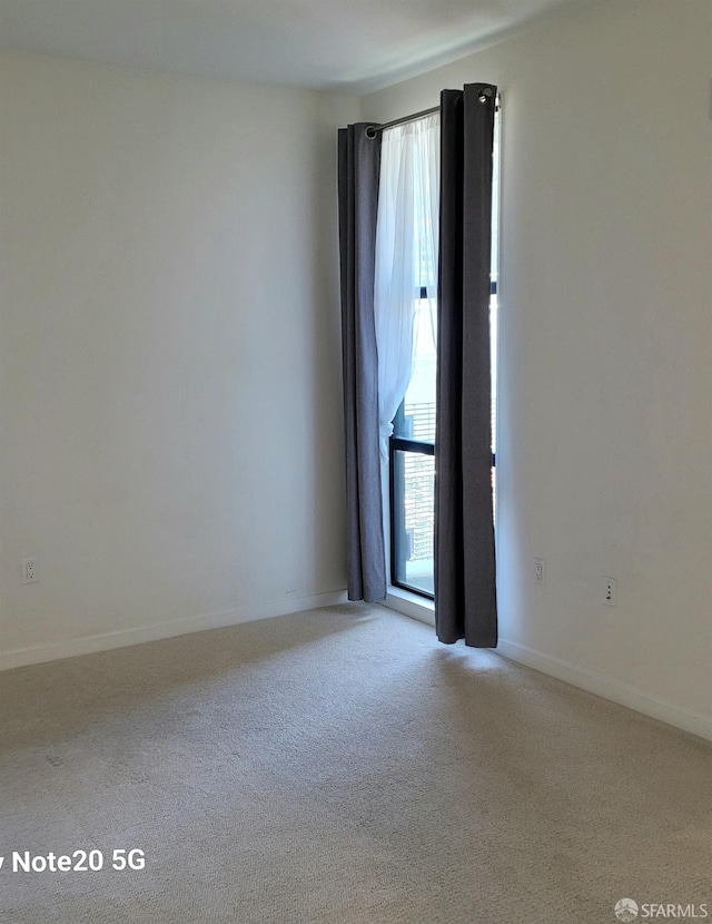 view of carpeted spare room