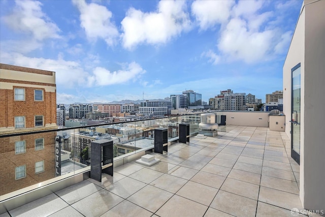 view of patio featuring a balcony