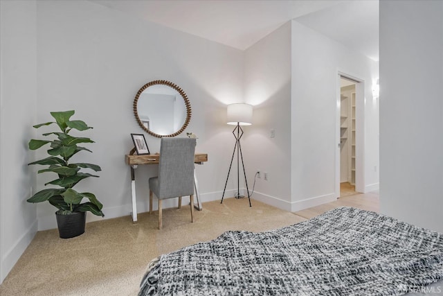 bedroom featuring light colored carpet