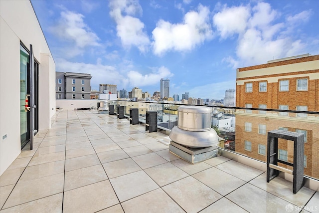 view of patio featuring a balcony