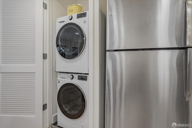 1080 Sutter St Unit 202, San Francisco, CA 94109 - washroom featuring stacked washer and clothes dryer