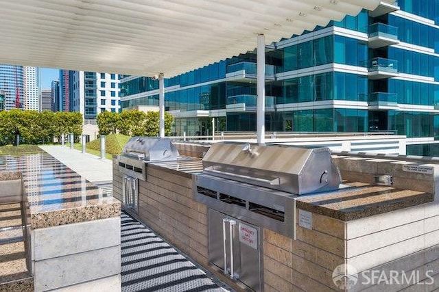 425 1st St Unit 1402, San Francisco, CA 94105 - view of patio / terrace featuring an outdoor kitchen and a city view
