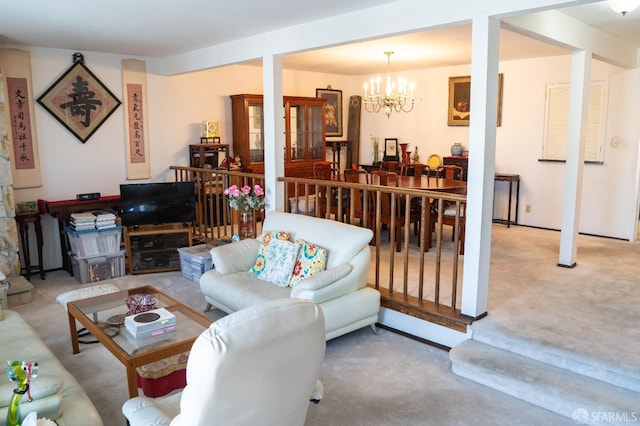 living room featuring a chandelier and light carpet