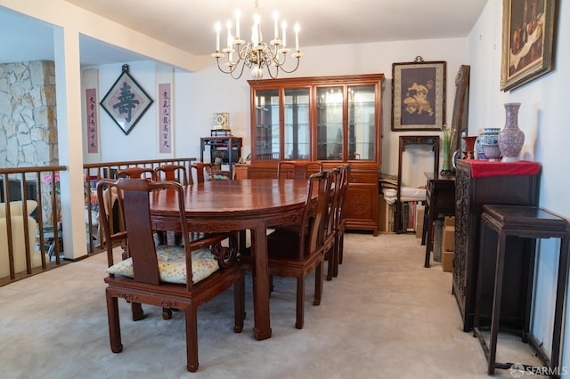 carpeted dining room with an inviting chandelier