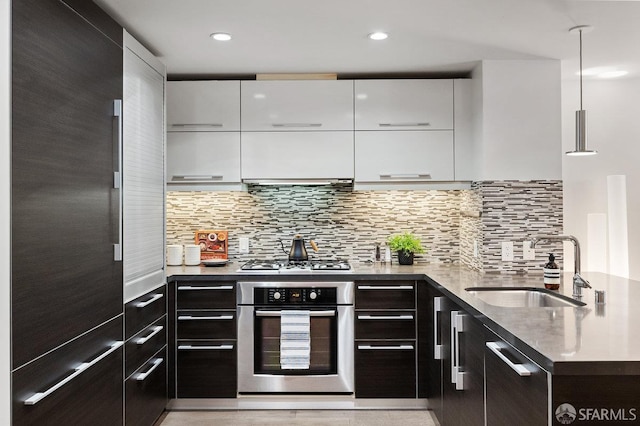 420 Mission Bay Blvd Unit 311, San Francisco, CA 94158 - kitchen with appliances with stainless steel finishes, modern cabinets, white cabinets, and recessed lighting