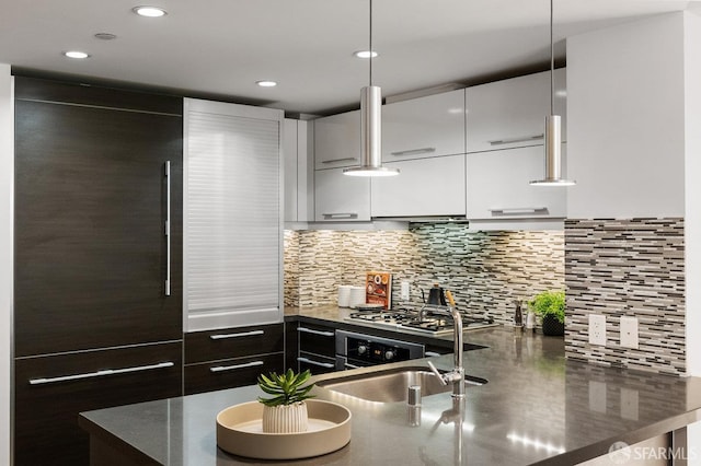 420 Mission Bay Blvd Unit 311, San Francisco, CA 94158 - kitchen with modern cabinets, stainless steel gas stovetop, decorative backsplash, recessed lighting, and oven