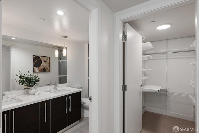 420 Mission Bay Blvd Unit 311, San Francisco, CA 94158 - full bath with double vanity, a spacious closet, and recessed lighting