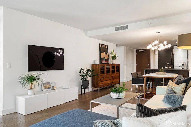 420 Mission Bay Blvd Unit 311, San Francisco, CA 94158 - living area featuring wood finished floors and a chandelier