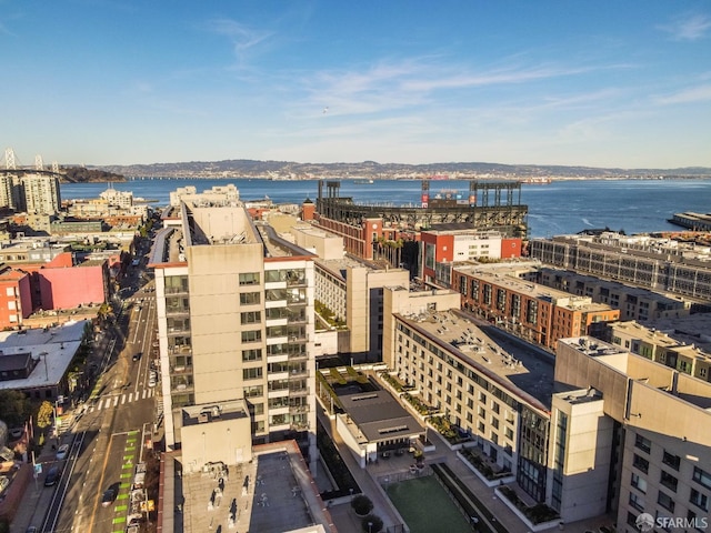 bird's eye view featuring a city view and a water view