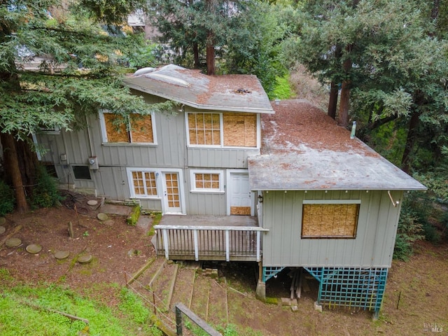 rear view of house with a deck