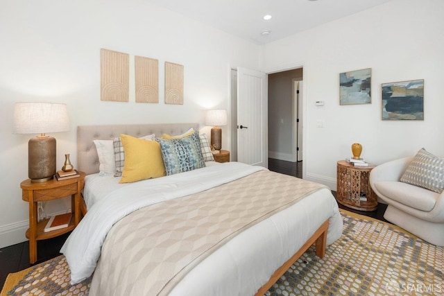 bedroom featuring recessed lighting, baseboards, and wood finished floors