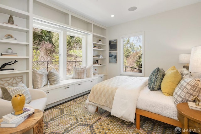 bedroom with recessed lighting