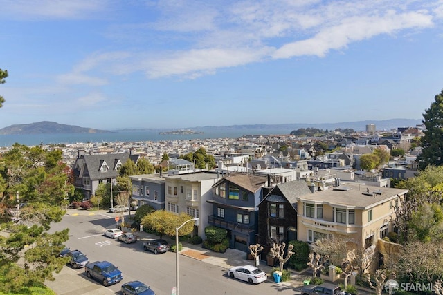 drone / aerial view with a mountain view and a residential view