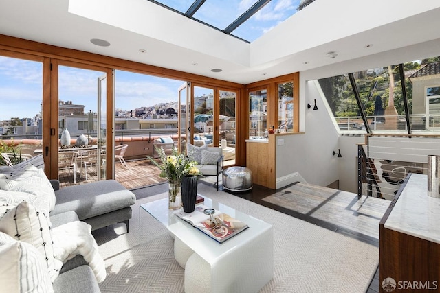 living area featuring a skylight