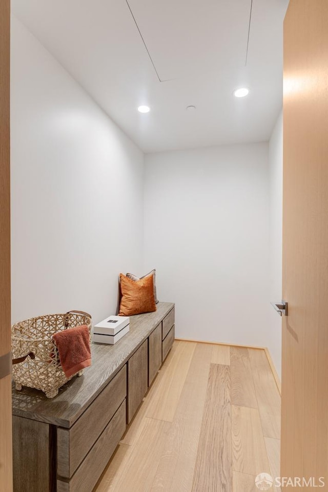 mudroom featuring light wood finished floors, attic access, and recessed lighting