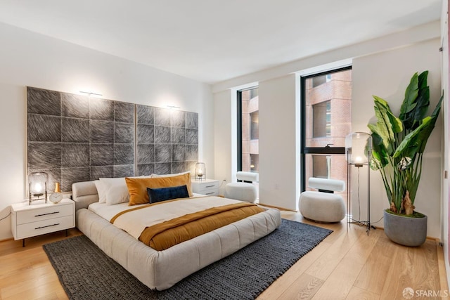 bedroom featuring light wood finished floors