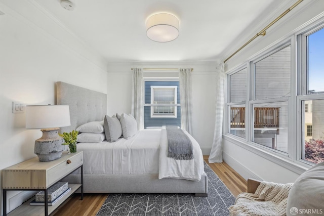1383 8th Ave, San Francisco, CA 94122 - bedroom featuring wood finished floors and baseboards