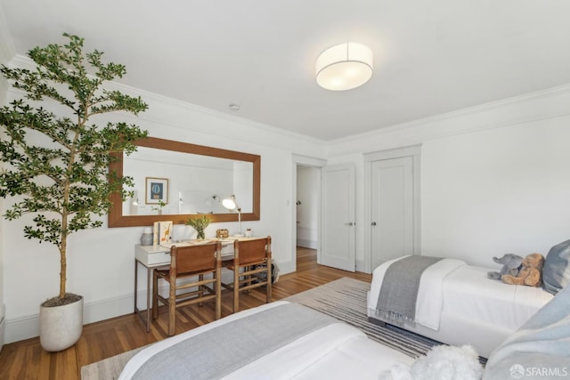 1383 8th Ave, San Francisco, CA 94122 - bedroom with wood finished floors and crown molding