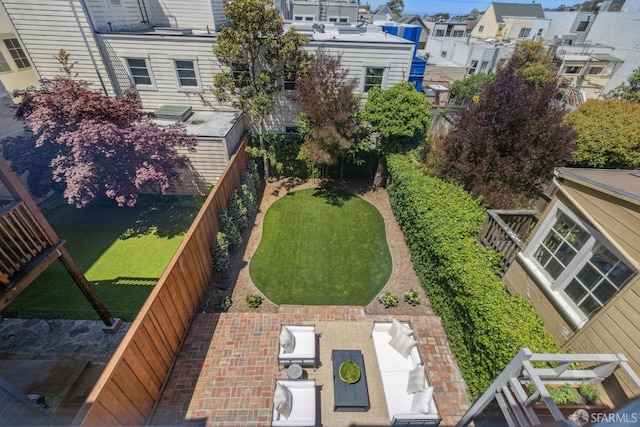 1383 8th Ave, San Francisco, CA 94122 - fenced backyard with a residential view and a patio area