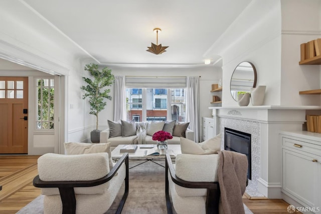 1383 8th Ave, San Francisco, CA 94122 - living area featuring a glass covered fireplace and healthy amount of natural light