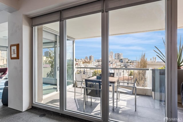 balcony featuring a city view