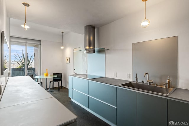 kitchen featuring black electric stovetop, ventilation hood, a sink, and decorative light fixtures