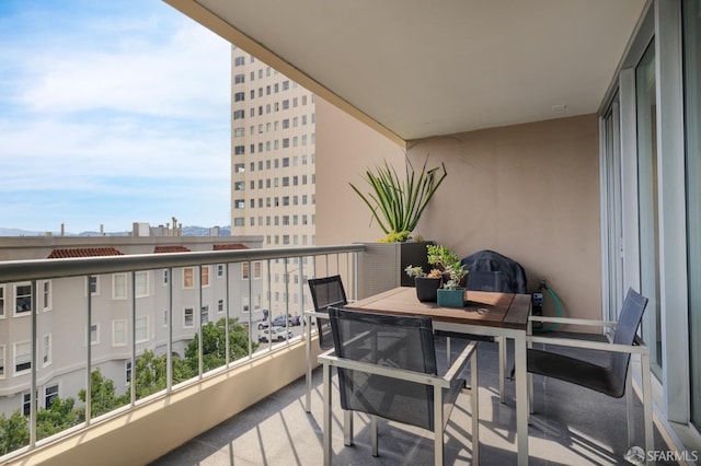 balcony featuring a city view