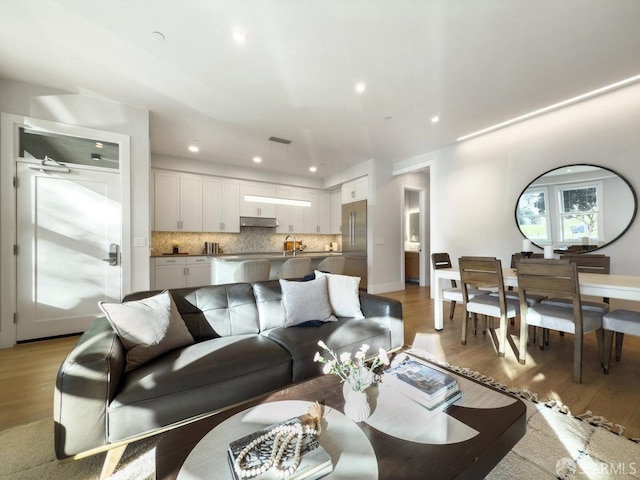 living room featuring light hardwood / wood-style floors