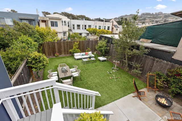 807 Vienna St, San Francisco, CA 94112 - fenced backyard with a patio area, an outdoor hangout area, and a residential view