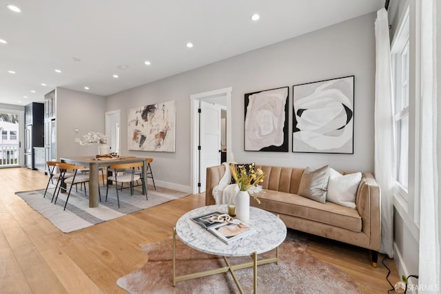 807 Vienna St, San Francisco, CA 94112 - living room featuring light wood-style flooring and recessed lighting