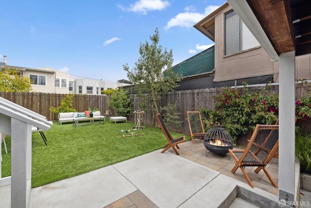 807 Vienna St, San Francisco, CA 94112 - fenced backyard featuring a patio and an outdoor living space with a fire pit