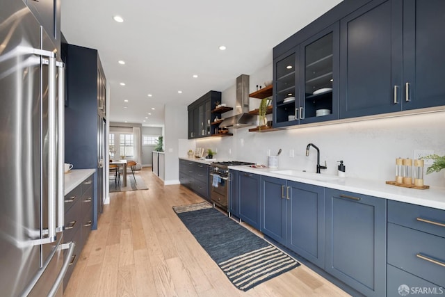807 Vienna St, San Francisco, CA 94112 - bar featuring high quality appliances, island exhaust hood, light wood-style floors, and recessed lighting