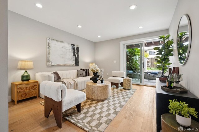 807 Vienna St, San Francisco, CA 94112 - living room featuring light wood-style flooring and recessed lighting