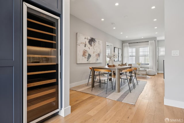 807 Vienna St, San Francisco, CA 94112 - dining space featuring wine cooler, light wood finished floors, and recessed lighting