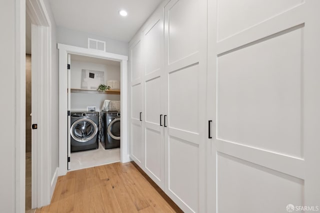 807 Vienna St, San Francisco, CA 94112 - laundry room with independent washer and dryer, light wood-style floors, and recessed lighting