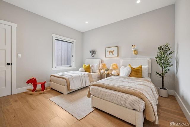 807 Vienna St, San Francisco, CA 94112 - bedroom with light wood-type flooring and recessed lighting