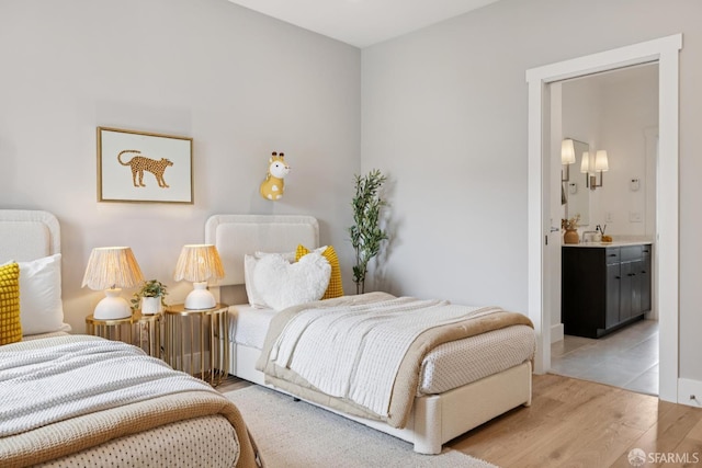 807 Vienna St, San Francisco, CA 94112 - bedroom featuring wood finished floors and ensuite bathroom