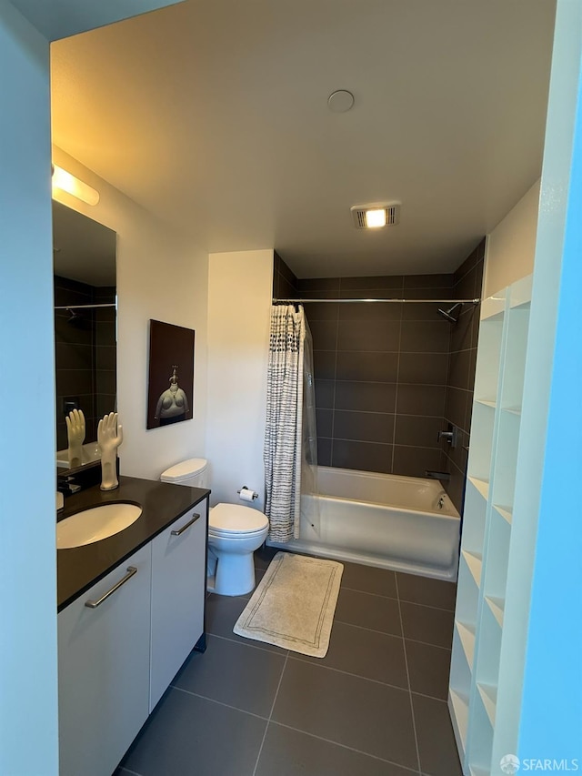 1075 Market St Unit 810, San Francisco, CA 94103 - bathroom featuring vanity, tile patterned flooring, toilet, and shower / tub combo