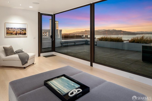 interior space featuring recessed lighting and wood finished floors