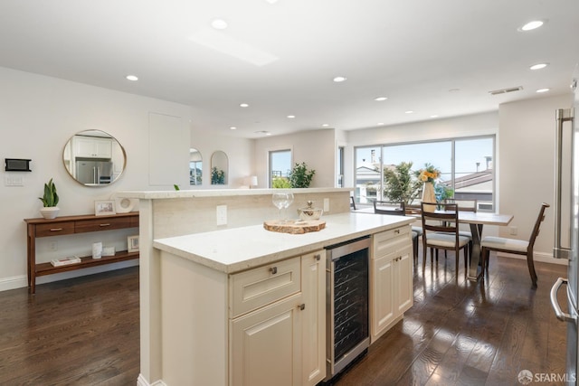 104 Bache St Unit A, San Francisco, CA 94110 - kitchen featuring wine cooler, dark wood-type flooring, a center island, recessed lighting, and baseboards