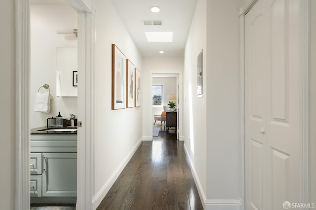 104 Bache St Unit A, San Francisco, CA 94110 - hall with dark wood finished floors, a sink, and baseboards