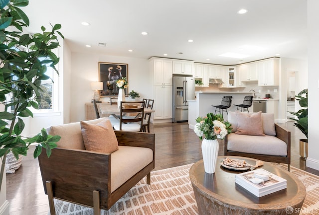 104 Bache St Unit A, San Francisco, CA 94110 - living room featuring light wood-style flooring and recessed lighting