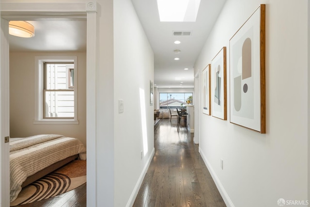 104 Bache St Unit A, San Francisco, CA 94110 - hall featuring dark wood-type flooring, a skylight, baseboards, and recessed lighting