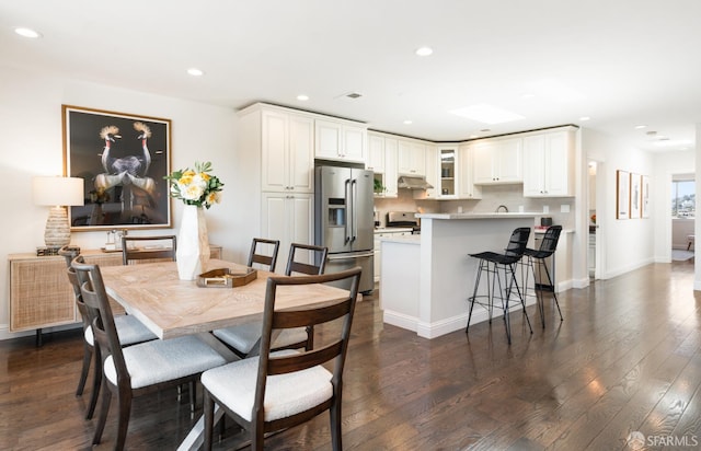 104 Bache St Unit A, San Francisco, CA 94110 - dining room featuring recessed lighting, dark wood-style flooring, and baseboards